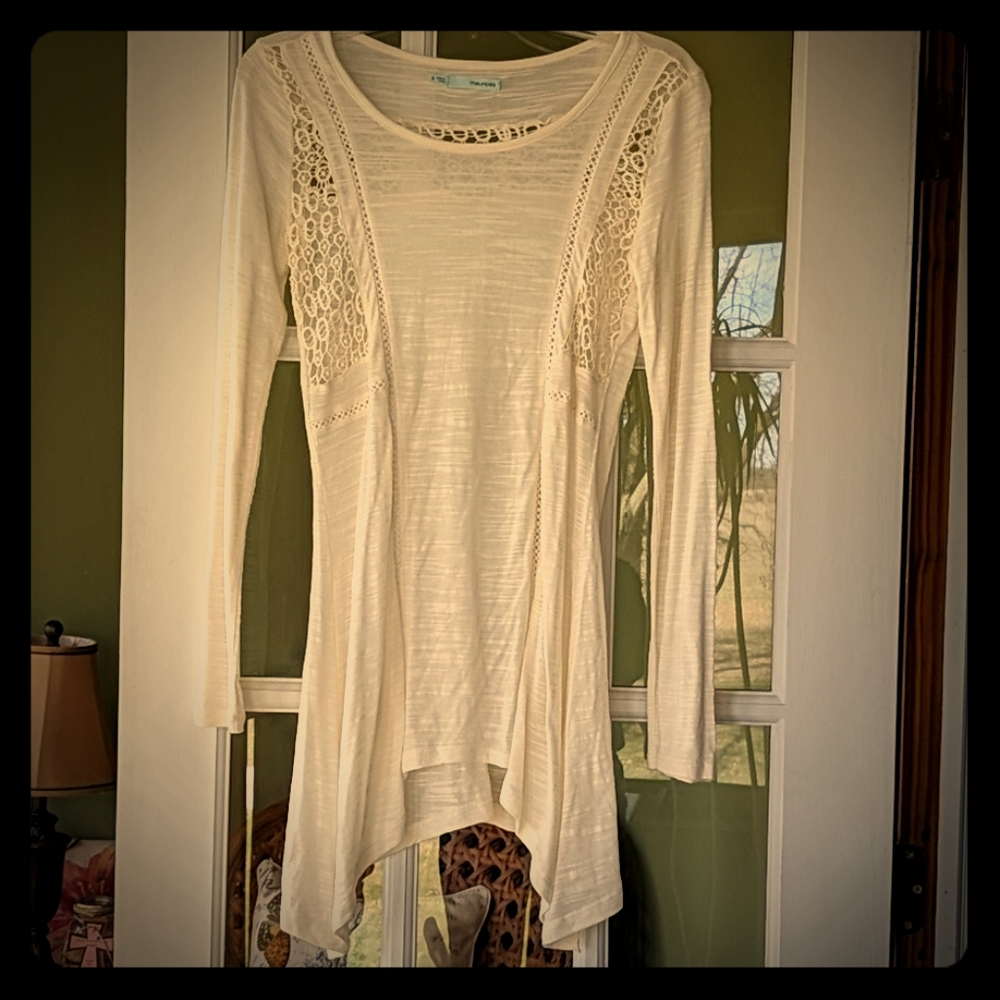 Long top with open lace detail.